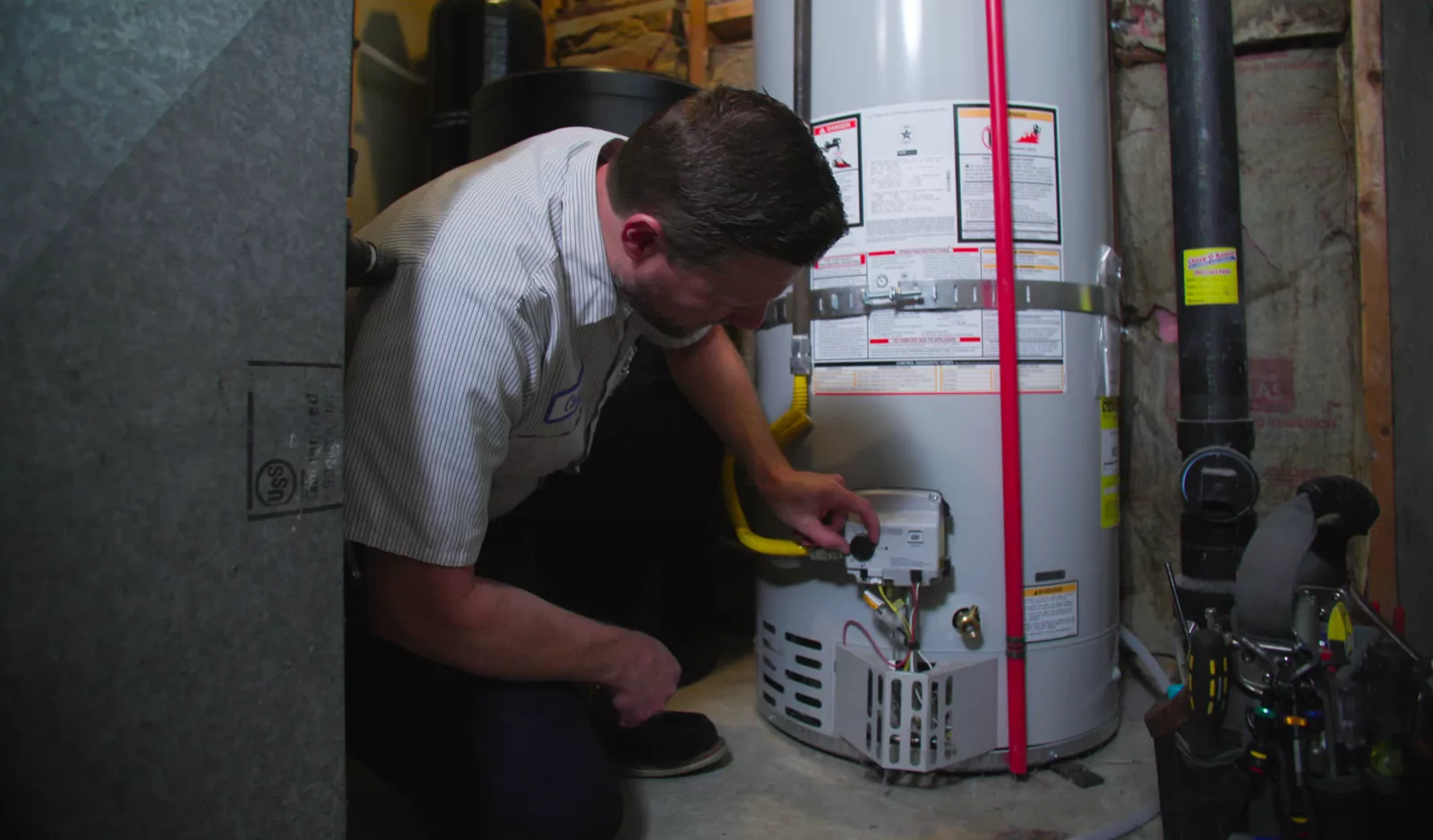 Donahue plumber replacing a water heater